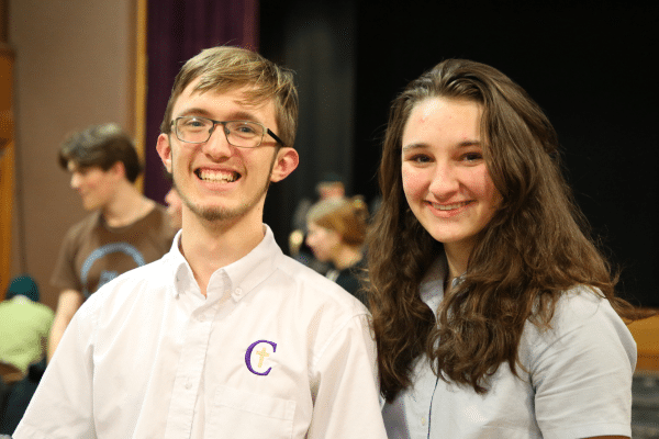 two students smiling