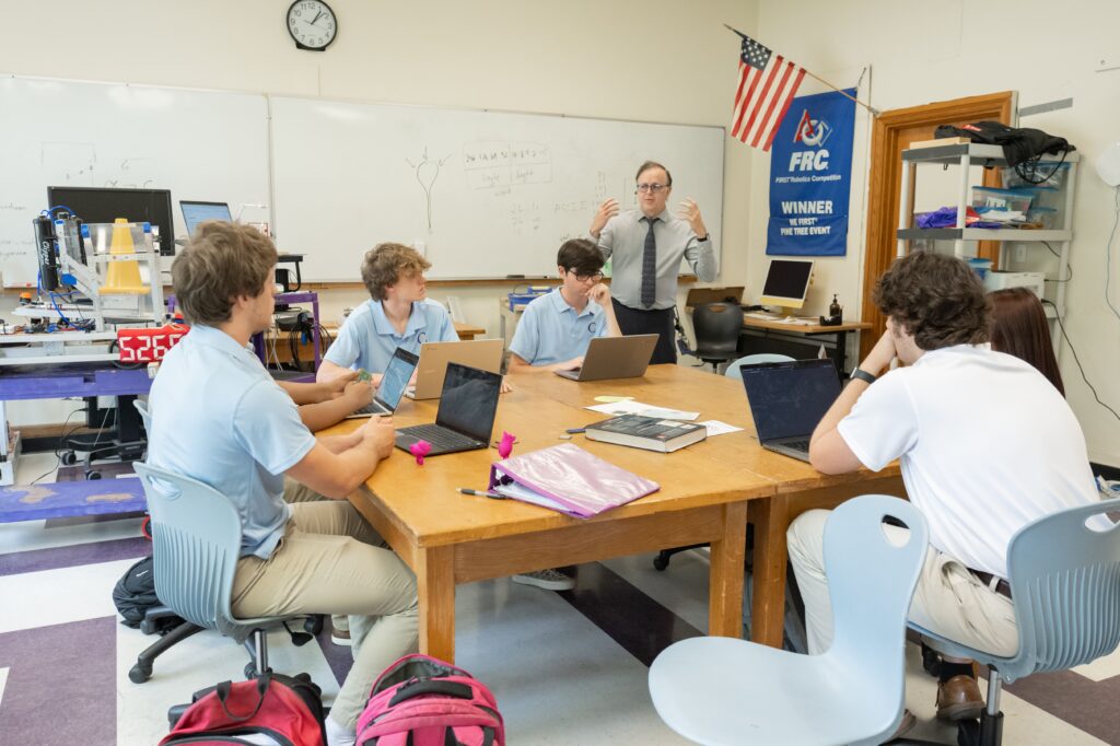 teacher with students in classroom